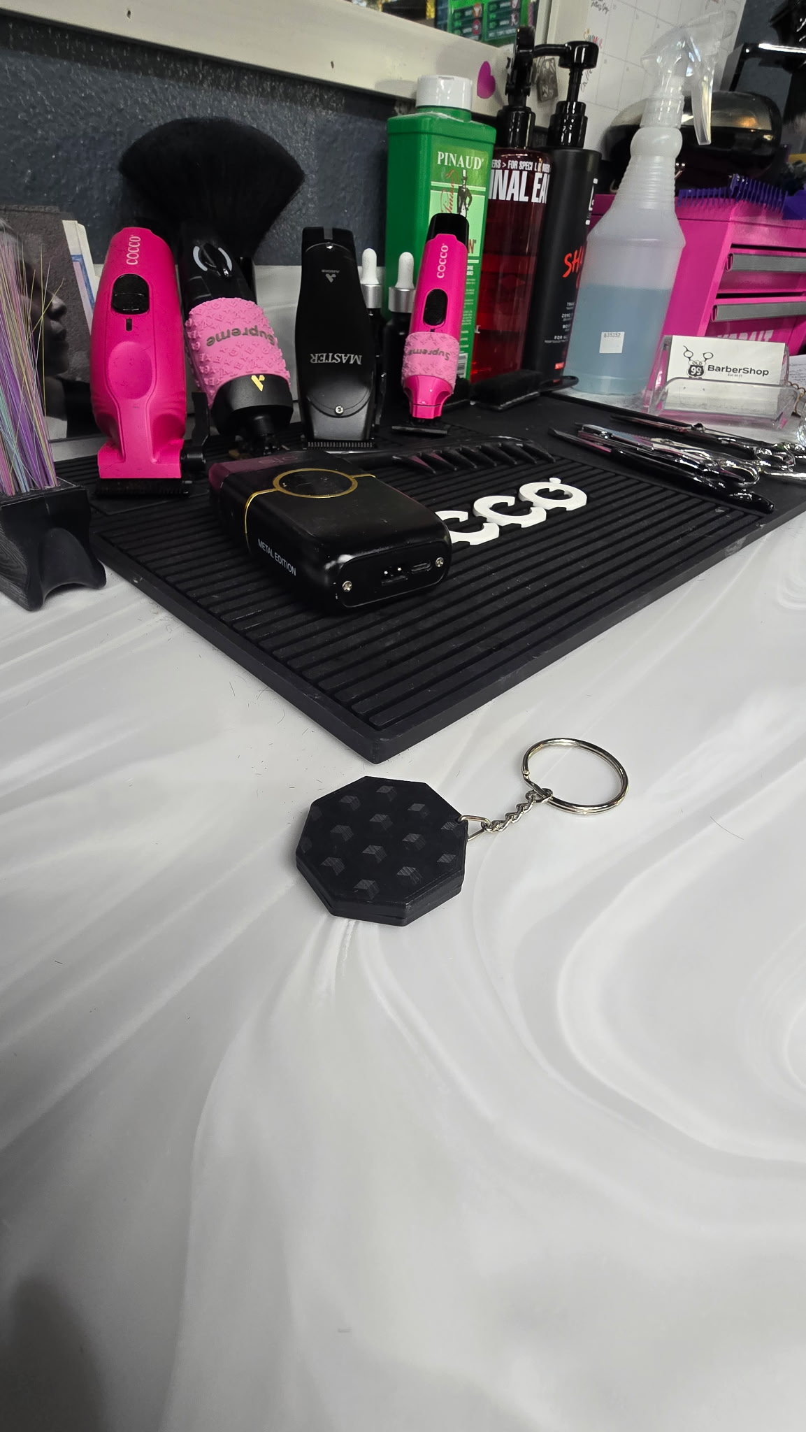 Tap Fade fob in a real barber station